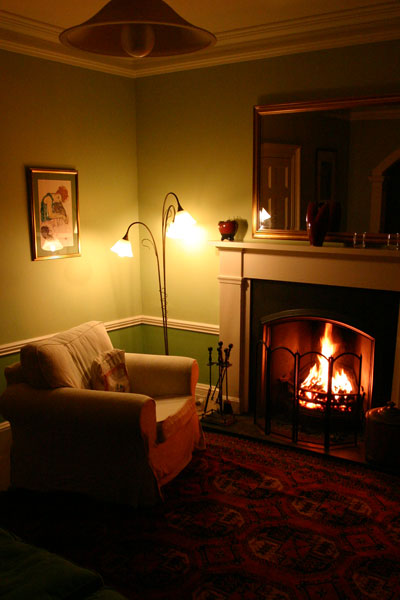 The sitting room - cosy by the fire